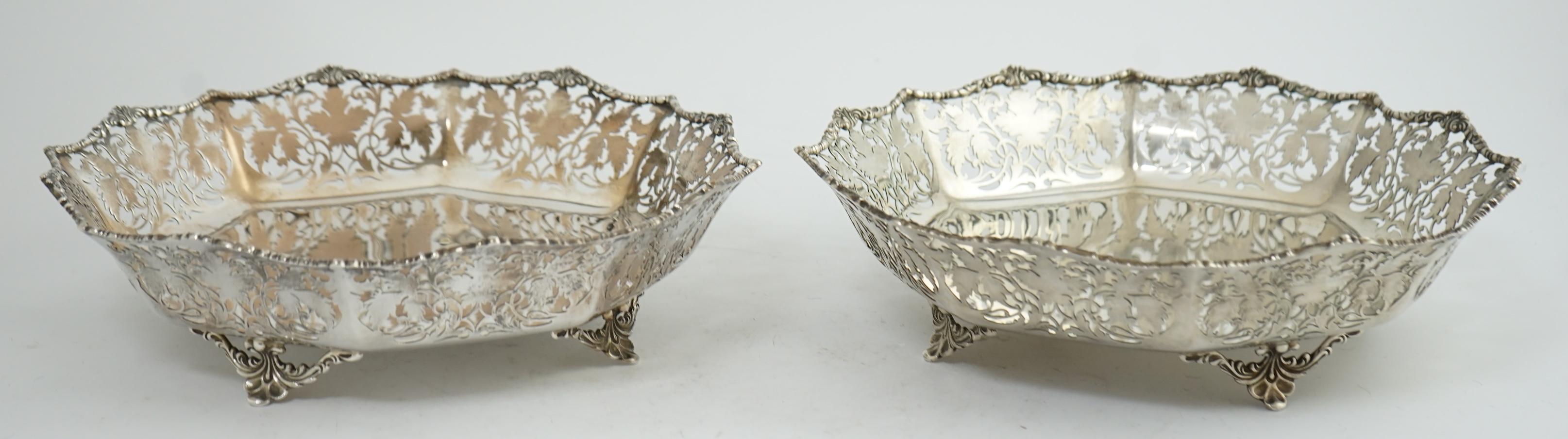 A pair of George VI pierced silver shallow circular fruit bowls, by Mappin & Webb